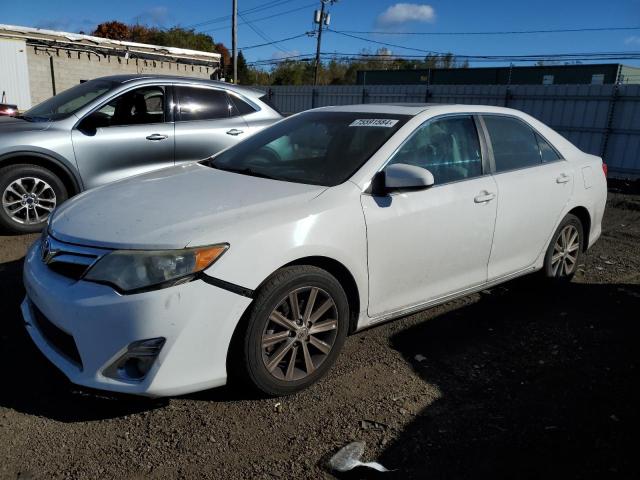 TOYOTA CAMRY HYBR 2012 with VIN 4T1BD1FKXCU063532 - Photo from auction