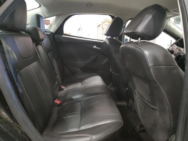 Photo 10 from auction – 2014 FORD FOCUS TITA with VIN 1FADP3J22EL192791