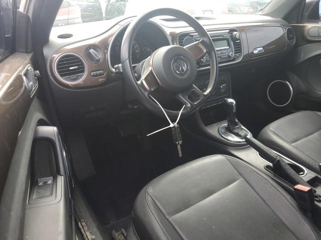Photo 8 from auction – 2012 VOLKSWAGEN BEETLE with VIN 3VWJX7AT6CM663783