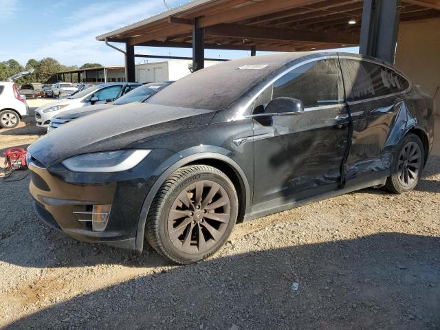 TESLA MODEL X 2018 with VIN 5YJXCDE2XJF091143 - Photo from auction