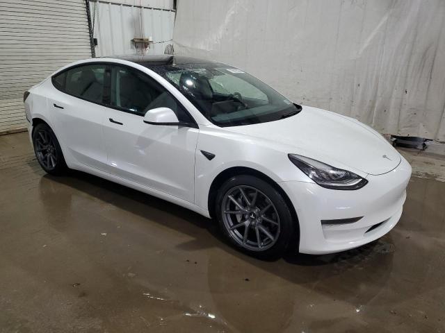 Photo 4 from auction – 2021 TESLA MODEL 3 with VIN 5YJ3E1EAXMF854734