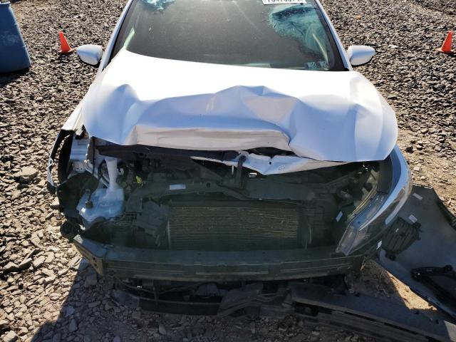 Photo 11 from auction – 2017 KIA FORTE LX with VIN 3KPFL4A74HE022364