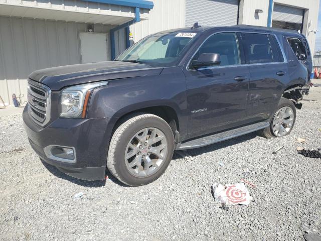 GMC YUKON SLE 2016 with VIN 1GKS2AKC1GR402880 - Photo from auction