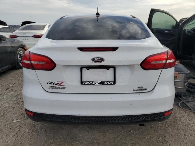 Photo 6 from auction – 2015 FORD FOCUS SE with VIN 1FADP3F23FL215201