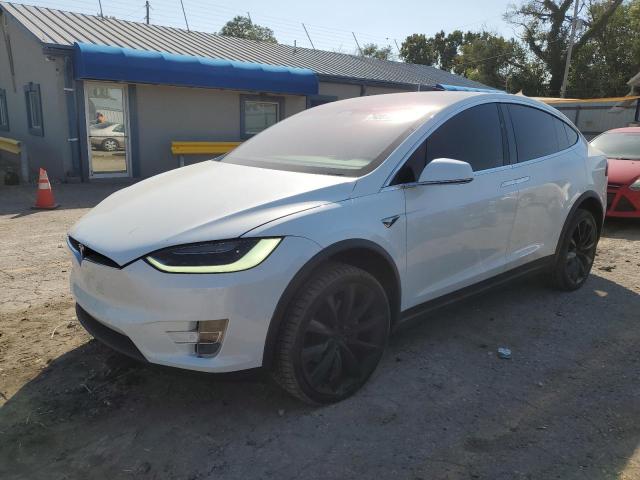 TESLA MODEL X 2018 with VIN 5YJXCBE24JF141068 - Photo from auction
