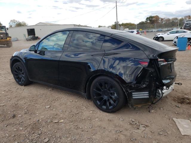Photo 2 from auction – 2021 TESLA MODEL Y with VIN 5YJYGDEE8MF119805