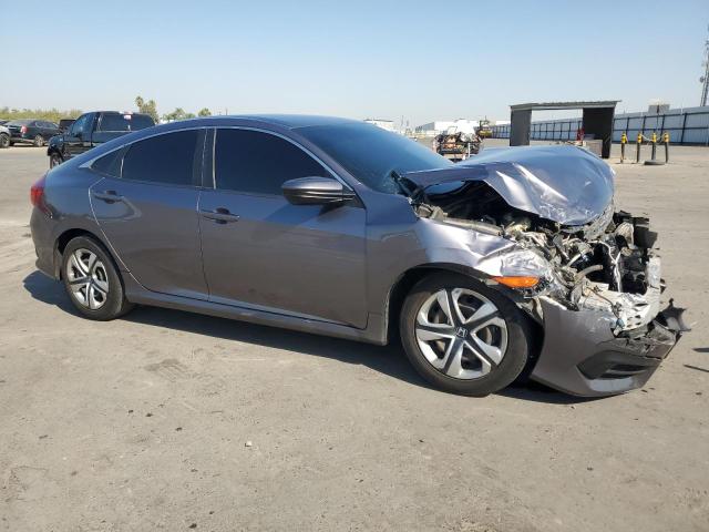 Photo 4 from auction – 2018 HONDA CIVIC LX with VIN 19XFC2F59JE203199