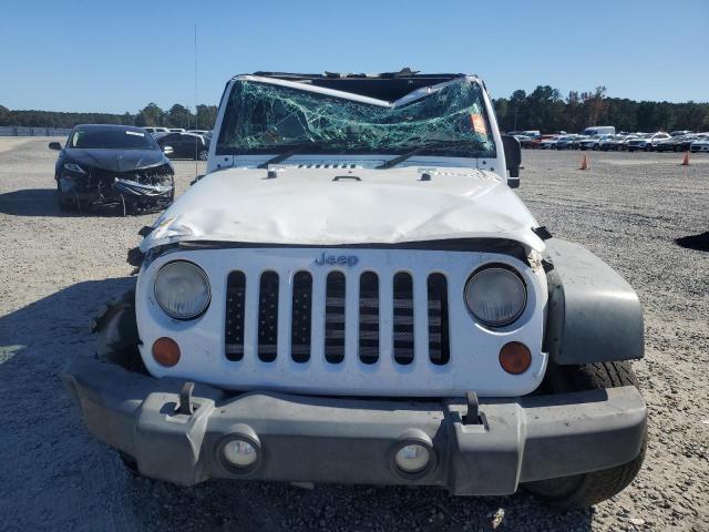 Photo 5 from auction – 2011 JEEP WRANGLER U with VIN 1J4BZ3H19BL602632