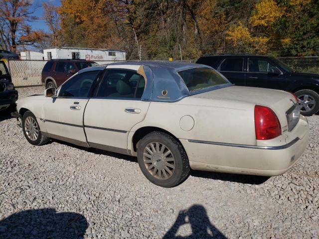 Photo 2 from auction – 2003 LINCOLN TOWN CAR E with VIN 1LNHM81W53Y704656