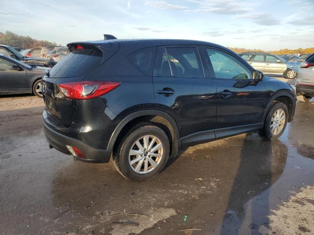 Photo 3 from auction – 2014 MAZDA CX-5 TOURI with VIN JM3KE4CY9E0383342