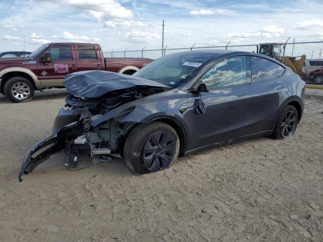 TESLA MODEL Y 2024 with VIN 7SAYGDEE1RA322283 - Photo from auction