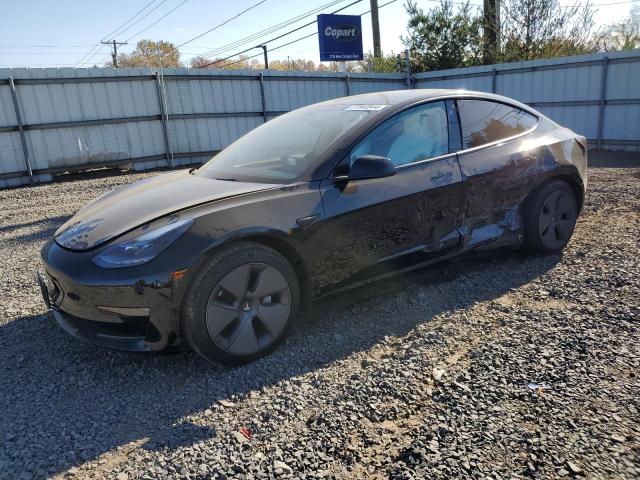 TESLA MODEL 3 2022 with VIN 5YJ3E1EB8NF110785 - Photo from auction