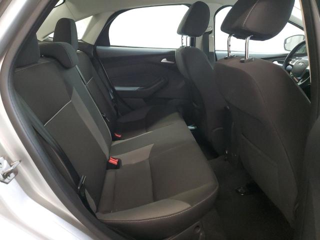 Foto 10 de la subasta – 2014 FORD FOCUS SE con VIN 1FADP3F25EL106107