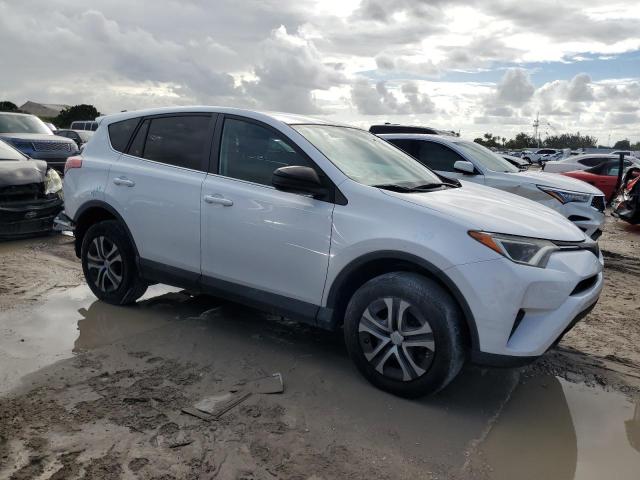 Photo 4 from auction – 2018 TOYOTA RAV4 LE with VIN 2T3ZFREV2JW443133