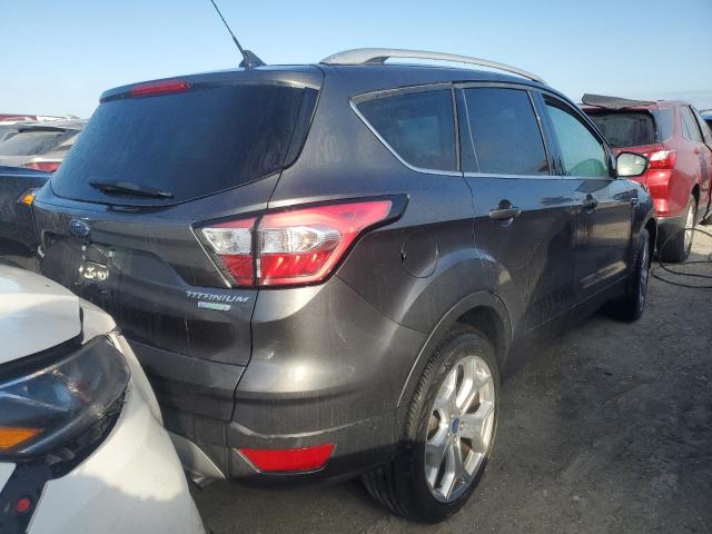 Photo 3 from auction – 2018 FORD ESCAPE TIT with VIN 1FMCU0J91JUC45085