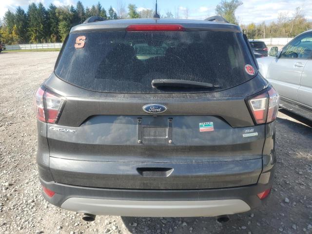 Photo 6 from auction – 2018 FORD ESCAPE SE with VIN 1FMCU0GD8JUC85403