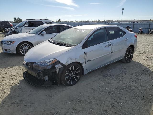 TOYOTA COROLLA L 2019 with VIN 2T1BURHE5KC207249 - Photo from auction