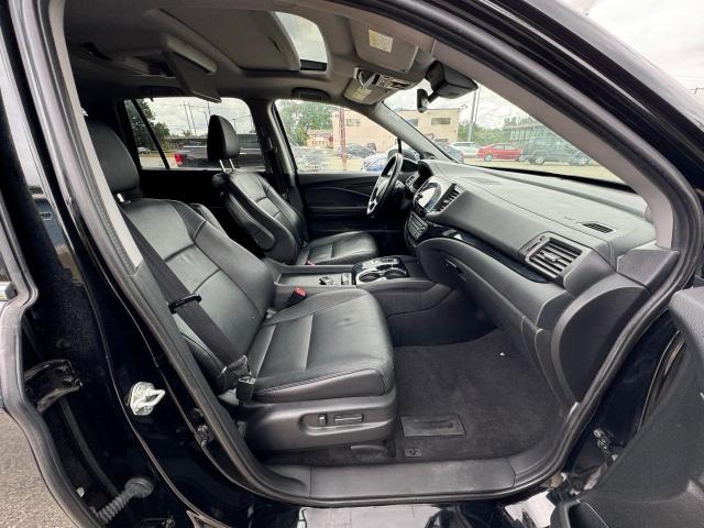 Photo 5 from auction – 2021 HONDA PILOT TOUR with VIN 5FNYF6H94MB012683