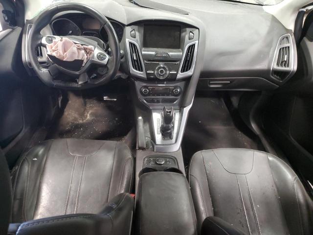 Photo 8 from auction – 2014 FORD FOCUS TITA with VIN 1FADP3J22EL192791