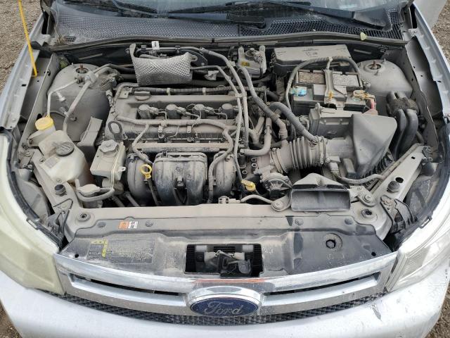 Photo 11 from auction – 2009 FORD FOCUS S with VIN 1FAHP34N79W211010