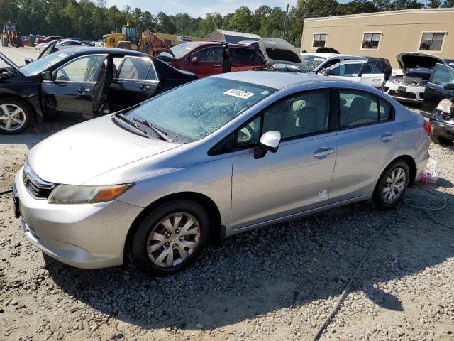 HONDA CIVIC LX 2012 with VIN 19XFB2F52CE066290 - Photo from auction