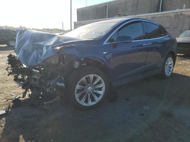 TESLA MODEL X 2018 with VIN 5YJXCAE24JF140822 - Photo from auction
