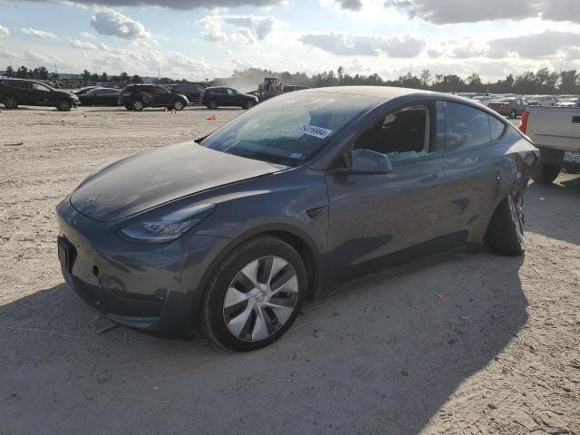 TESLA MODEL Y 2022 with VIN 7SAYGDEE8NA004610 - Photo from auction