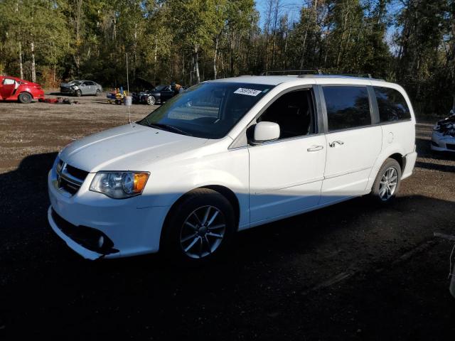 DODGE GRAND CARA 2015 with VIN 2C4RDGBG7FR729190 - Photo from auction