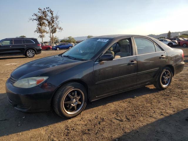TOYOTA CAMRY LE 2002 with VIN 4T1BE30K32U006556 - Photo from auction