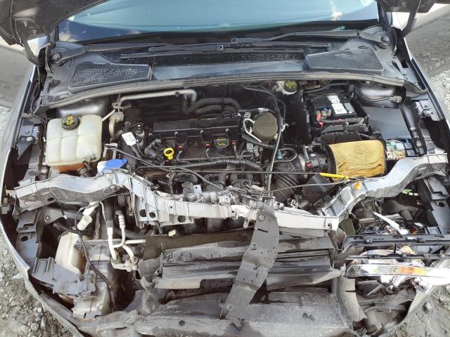 Photo 11 from auction – 2014 FORD FOCUS SE with VIN 1FADP3F29EL174684