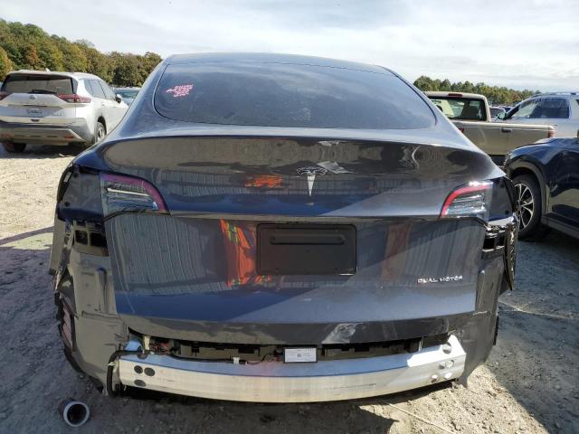 Photo 6 from auction – 2023 TESLA MODEL Y with VIN 7SAYGDEE2PF799840