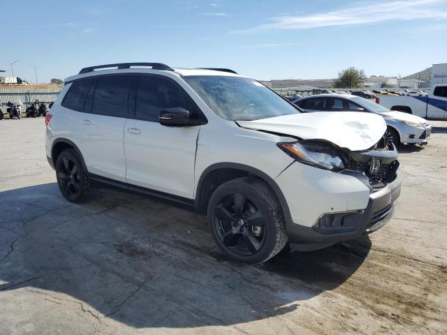 Photo 4 from auction – 2021 HONDA PASSPORT E with VIN 5FNYF8H01MB036372