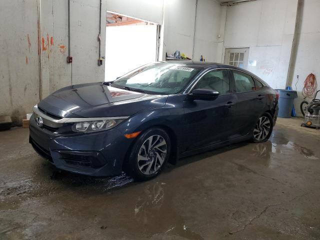 HONDA CIVIC EX 2018 with VIN 19XFC2F77JE008753 - Photo from auction