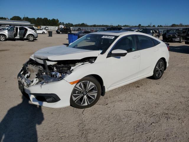 HONDA CIVIC EX 2018 with VIN JHMFC1F48JX007724 - Photo from auction