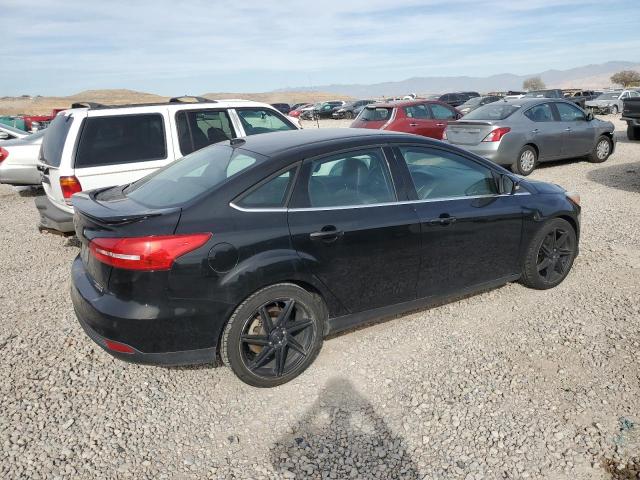 Photo 3 from auction – 2015 FORD FOCUS TITA with VIN 1FADP3J24FL281084