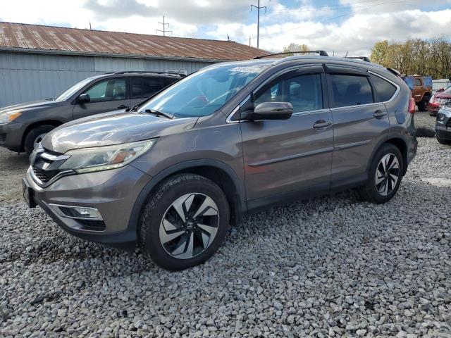 Photo 1 from auction – 2016 HONDA CR-V TOURI with VIN 5J6RM4H98GL024992