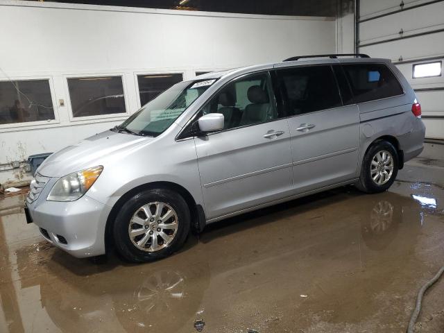 HONDA ODYSSEY EX 2010 with VIN 5FNRL3H67AB055041 - Photo from auction