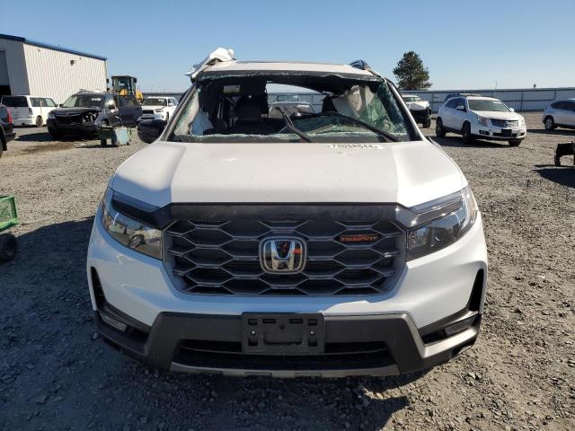 Photo 5 from auction – 2023 HONDA PASSPORT T with VIN 5FNYF8H67PB024204