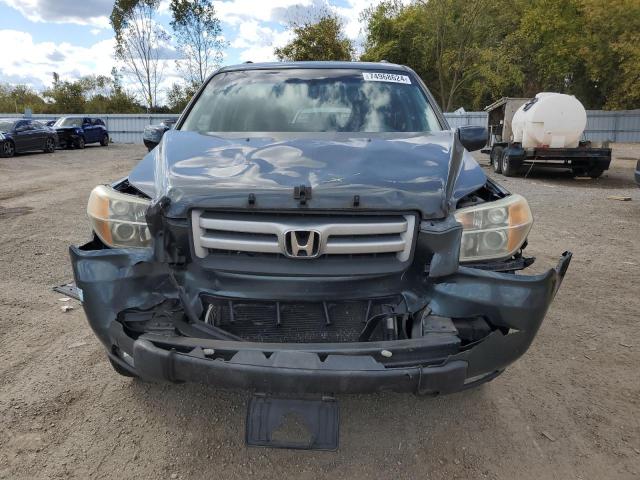 Photo 5 from auction – 2006 HONDA PILOT EX with VIN 2HKYF18636H003129
