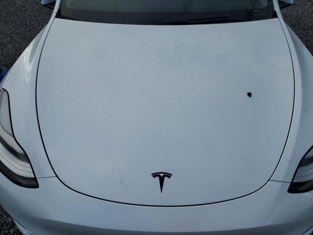 Photo 11 from auction – 2021 TESLA MODEL Y with VIN 5YJYGDEE7MF062061