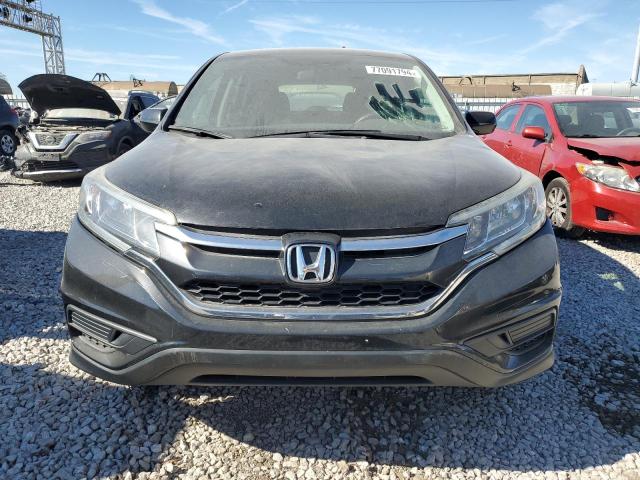 Photo 5 from auction – 2015 HONDA CR-V LX with VIN 2HKRM4H30FH693665