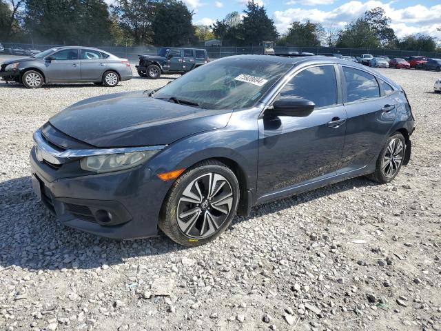 HONDA CIVIC EXL 2016 with VIN 19XFC1F76GE008147 - Photo from auction