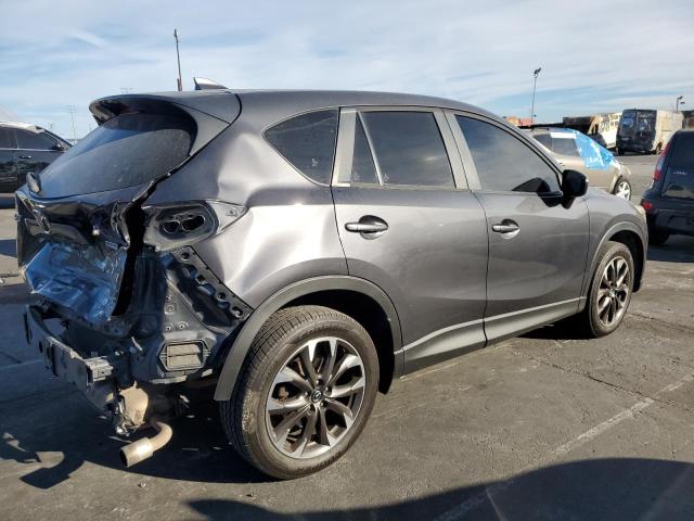 Photo 3 from auction – 2016 MAZDA CX-5 GT with VIN JM3KE2DY1G0823690