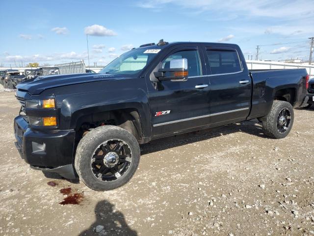 CHEVROLET SILVERADO 2018 with VIN 1GC1KWEYXJF178397 - Photo from auction