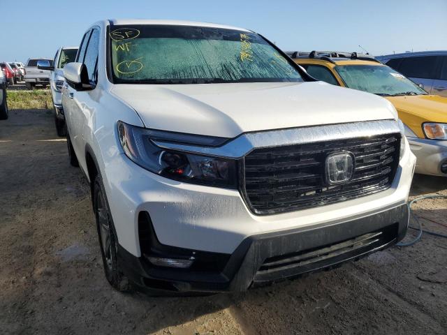 Photo 5 from auction – 2023 HONDA RIDGELINE with VIN 5FPYK3F77PB009557