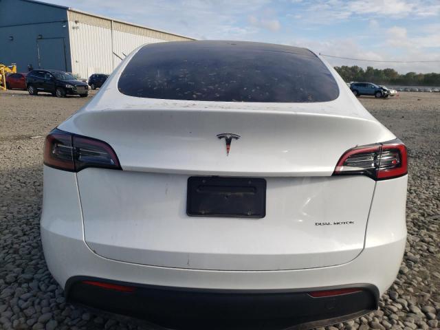 Photo 6 from auction – 2023 TESLA MODEL Y with VIN 7SAYGDEE2PA115480