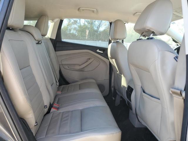 Photo 11 from auction – 2017 FORD ESCAPE TIT with VIN 1FMCU0J95HUA92348