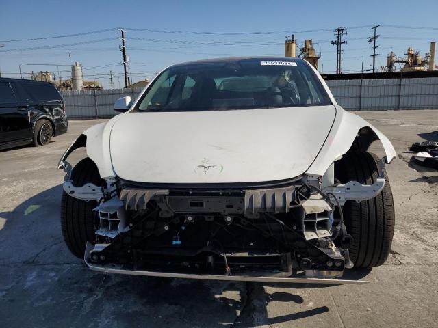 Photo 5 from auction – 2021 TESLA MODEL 3 with VIN 5YJ3E1EA0MF100418