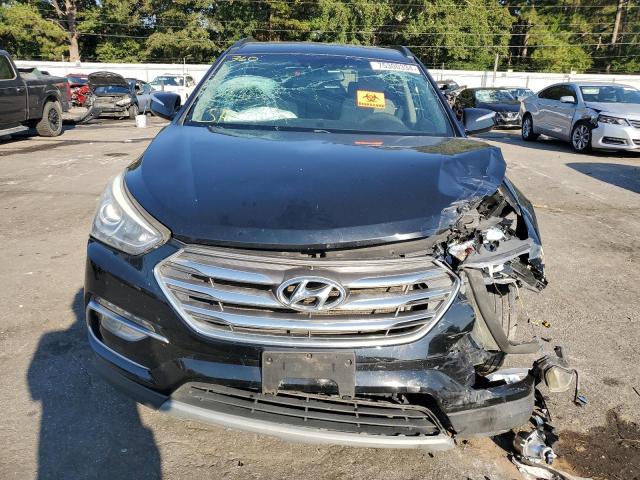 Photo 5 from auction – 2018 HYUNDAI SANTA FE S with VIN 5NMZU3LB5JH107637
