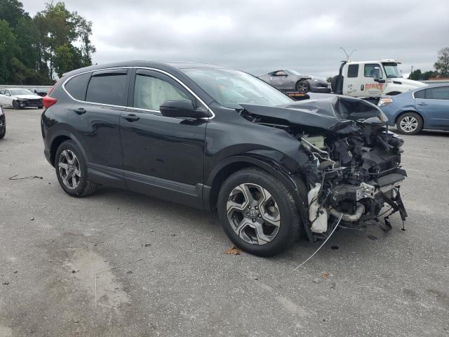 Photo 4 from auction – 2018 HONDA CR-V EXL with VIN 5J6RW1H88JA002011
